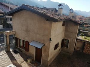 a small house with a view of a mountain at La Casina in Clusone