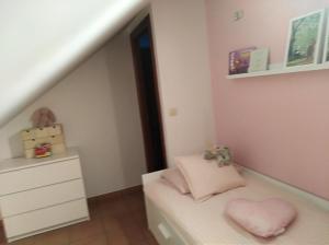 Łóżko lub łóżka w pokoju w obiekcie Insua