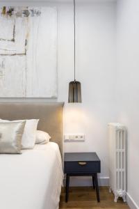 Postel nebo postele na pokoji v ubytování Callao Flat