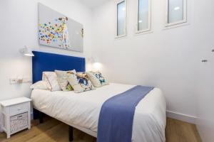 Postel nebo postele na pokoji v ubytování Callao Flat