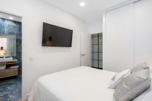 Postel nebo postele na pokoji v ubytování Callao Flat