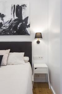 Postel nebo postele na pokoji v ubytování Callao Flat