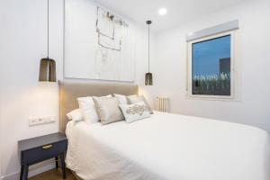Postel nebo postele na pokoji v ubytování Callao Flat