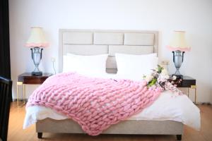 Letto o letti in una camera di OTAKHEBI
