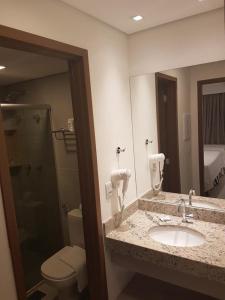Koupelna v ubytování Apartamento em Resort de Olímpia