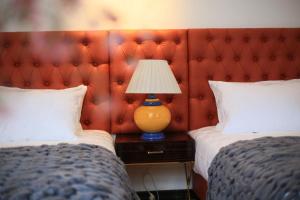 Letto o letti in una camera di OTAKHEBI