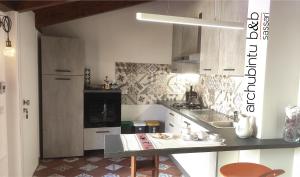 Kuchyň nebo kuchyňský kout v ubytování Archubintu B&B