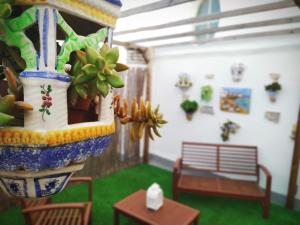 Posedenie v ubytovaní Hostal Casa Nautilus