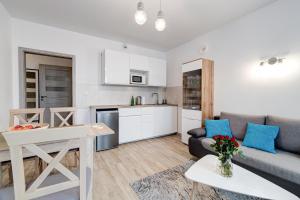 Кухня або міні-кухня у Apartament SŁONECZNY - Aprent