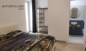 Postel nebo postele na pokoji v ubytování Archubintu B&B