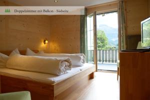 Voodi või voodid majutusasutuse Hotel Waldrand toas