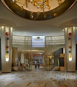 a lobby of a luxury hotel with a chandelier at Seminole Hard Rock Hotel & Casino Hollywood in Fort Lauderdale