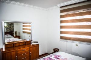 Postel nebo postele na pokoji v ubytování Ema Guest House