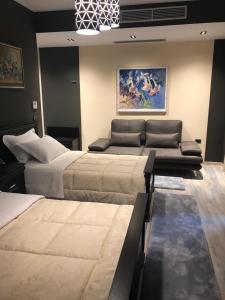Postel nebo postele na pokoji v ubytování Dream's Hotel
