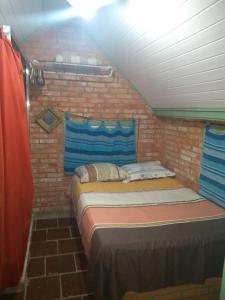 Katil atau katil-katil dalam bilik di CASA PRAIA BEIRA MAR COM PISCINA 5 QUARTOS ACOMODA 12 pessoas
