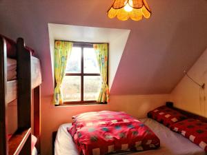 
A bed or beds in a room at Aille River Hostel Lodge Doolin
