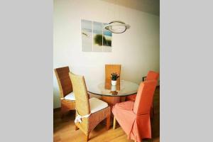 a dining room with a table and chairs at Apt next to Nuremberg central-station, Fair 10min in Nürnberg +23 photos