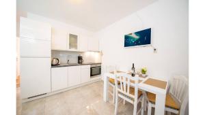 Kuchyň nebo kuchyňský kout v ubytování Apartments Magdalena