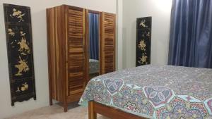 Rúm í herbergi á Chrisanns Hidden Cove 2 bedroom