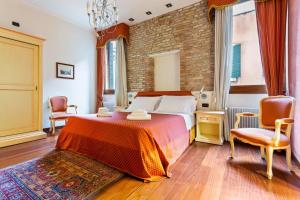 Postel nebo postele na pokoji v ubytování Venice Top Apartments and Rooms San Marco 2442-A