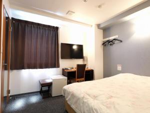 Televisyen dan/atau pusat hiburan di Toyama Town Hotel