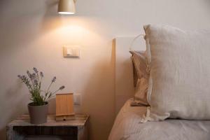 Postel nebo postele na pokoji v ubytování B&B Relais Druda