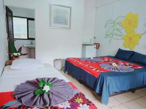 Tempat tidur dalam kamar di Olivias Accommodation