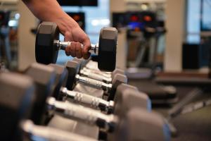 Das Fitnesscenter und/oder die Fitnesseinrichtungen in der Unterkunft Miracle Grand Convention Hotel