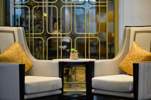 Ein Sitzbereich in der Unterkunft Miracle Grand Convention Hotel