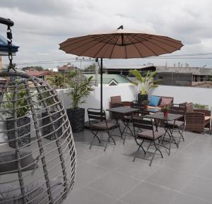 Balkón nebo terasa v ubytování Radlett Residences Hotel - Tuguegarao