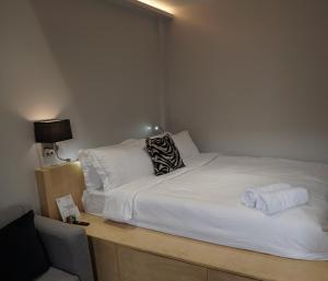 Postel nebo postele na pokoji v ubytování Radlett Residences Hotel - Tuguegarao