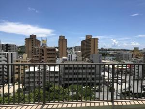 a view of a city with tall buildings at Weekly Harbourview Mansion Main Building / Vacation STAY 74562 in Naha