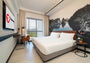 Postel nebo postele na pokoji v ubytování Travelodge Ipoh