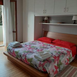 Postel nebo postele na pokoji v ubytování Alloggio il Giglio + 27 fotografií