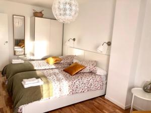 Postel nebo postele na pokoji v ubytování Apartamento Turístico El Enclave