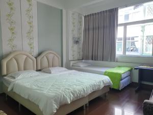a bedroom with a large bed and a window at Room For You in Bangkok +50 photos