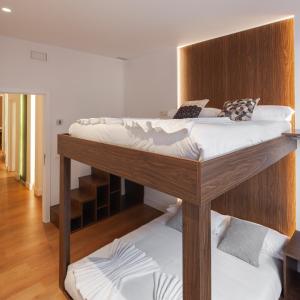Cama o camas de una habitación en Modern Apartment Gran Via IV Renovated 5BR 5BH