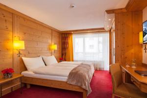 TV a/nebo společenská místnost v ubytování Hotel Holiday