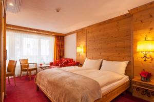 Postel nebo postele na pokoji v ubytování Hotel Holiday