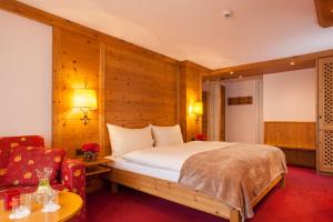 Postel nebo postele na pokoji v ubytování Hotel Holiday