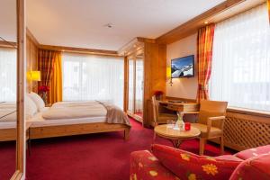 Postel nebo postele na pokoji v ubytování Hotel Holiday