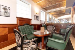 Posezení v ubytování Hotel Le Premier