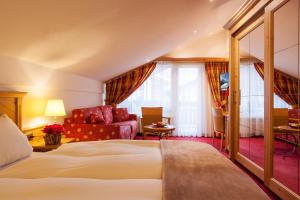 Postel nebo postele na pokoji v ubytování Hotel Holiday