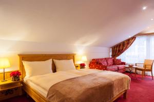 Postel nebo postele na pokoji v ubytování Hotel Holiday