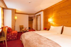 Postel nebo postele na pokoji v ubytování Hotel Holiday