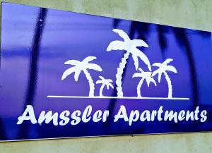 Certificato, attestato, insegna o altro documento esposto da Amssler Beach Stay