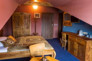Katil atau katil-katil dalam bilik di Pivnica a Penzion pri studni