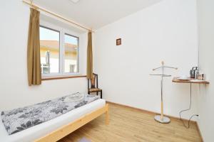 Postel nebo postele na pokoji v ubytování Břeclav centrum - U Pražáka