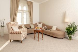 Posezení v ubytování Hotel Le Premier
