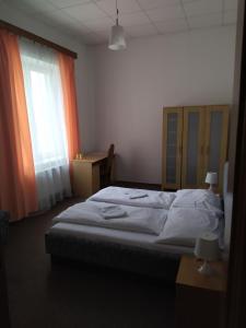Postel nebo postele na pokoji v ubytování Tourist room Maria